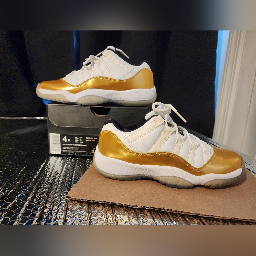 Jordan 11s Gold and white